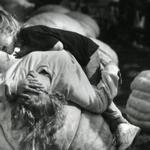 Oct. 9, 1990: Rachel and Casey Malec of Suffield, Conn., used their family’s pumpkin to play on during the pumpkin-judging contest. They took 15th place. A 470-pound pumpkin owned by Arthur Brooks Jr. of Auburn took first prize and won $1000.